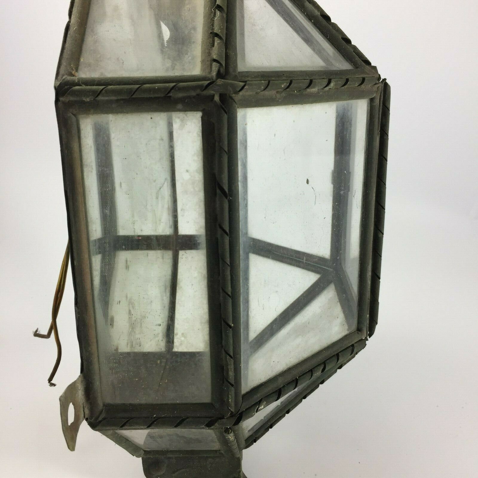 Metal and brass wall light with mirror background 1900