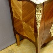 Louis XV style commode in marquetry around 1900