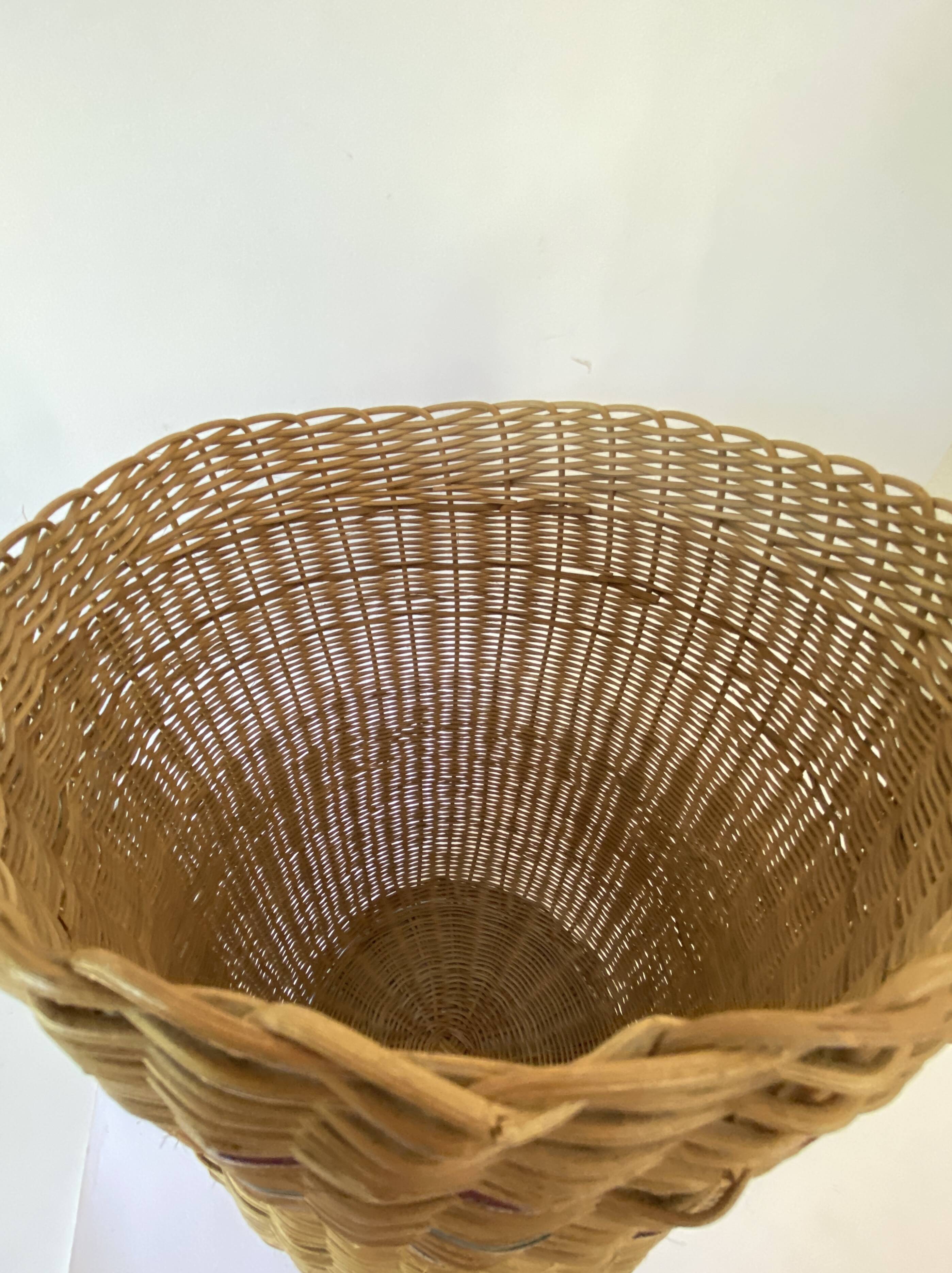 High basket with woven straws