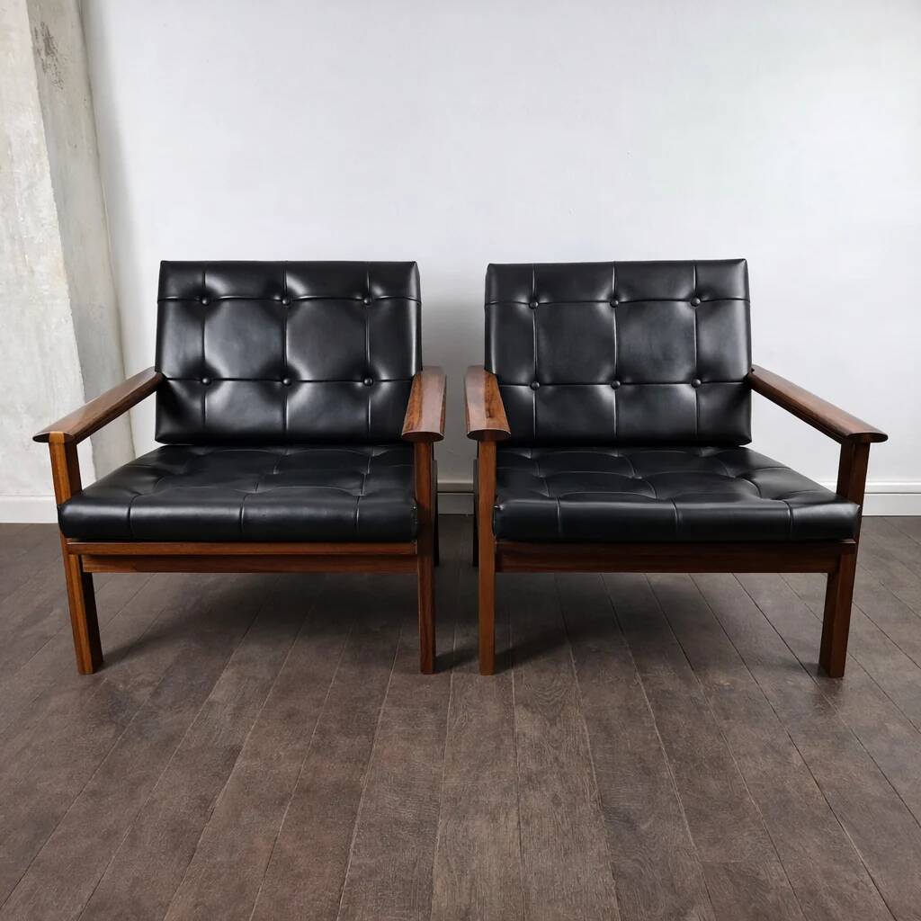 Pair of armchairs in rosewood model Capella by Illum Wikkelsø for Niels Eilersen, Denmark, 1960.