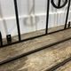 Wall-mounted coat rack in wrought iron, early 20th century