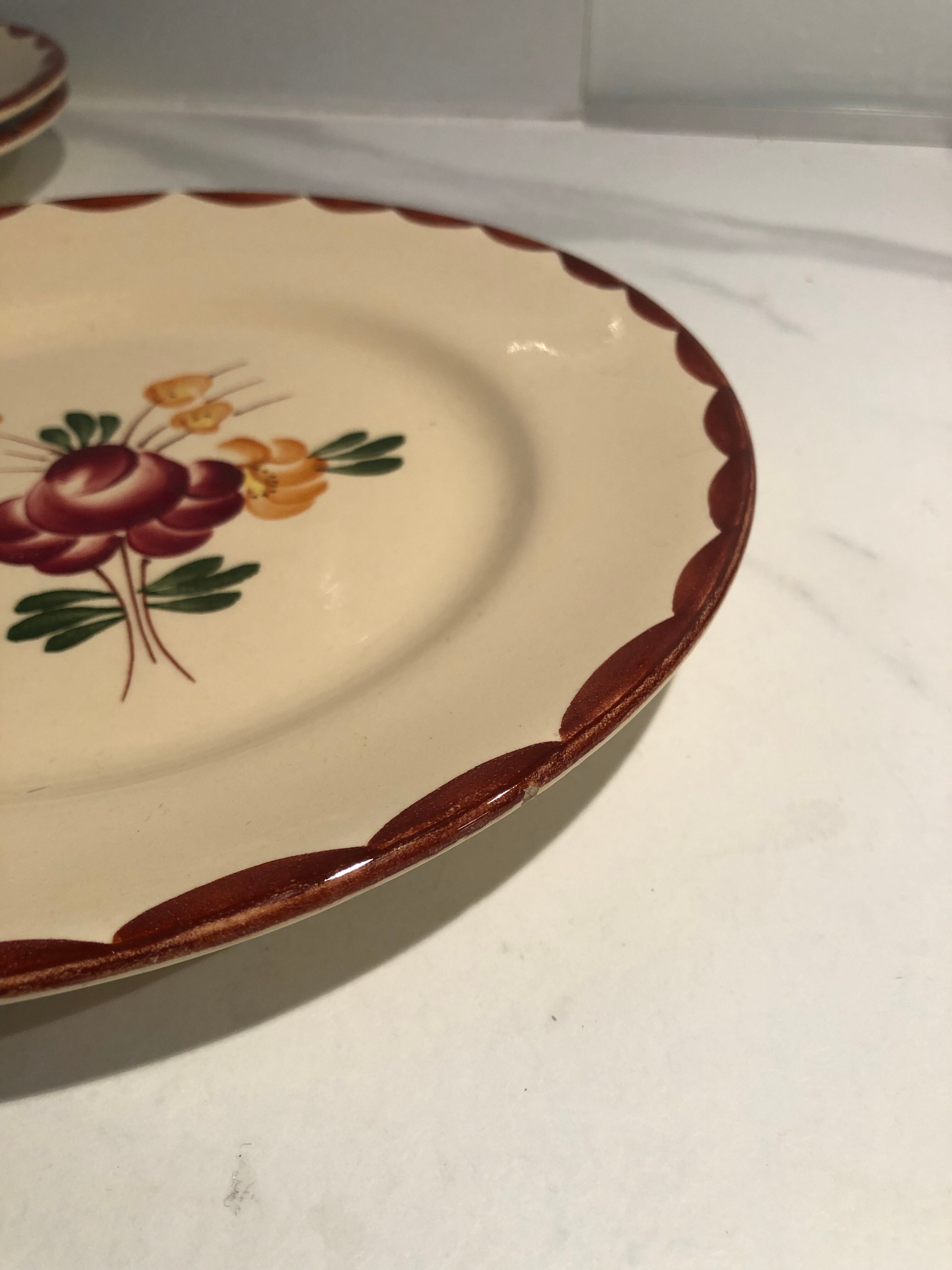 Six vintage Longchamp earthenware plates