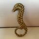 Small brass seahorse