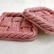 Woven pair of bottle coasters, in pink Vallauris earthenware.