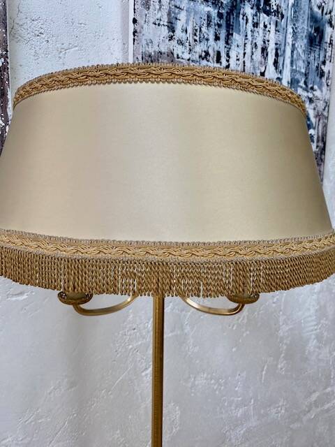 Tripod floor lamp in gold metal