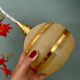 Vintage globe pendant light in yellow and gold granite glass