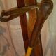 pair of vintage wooden Skis and their bats.