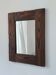 Vintage stained pine mirror, brutalist minimalist wooden design.