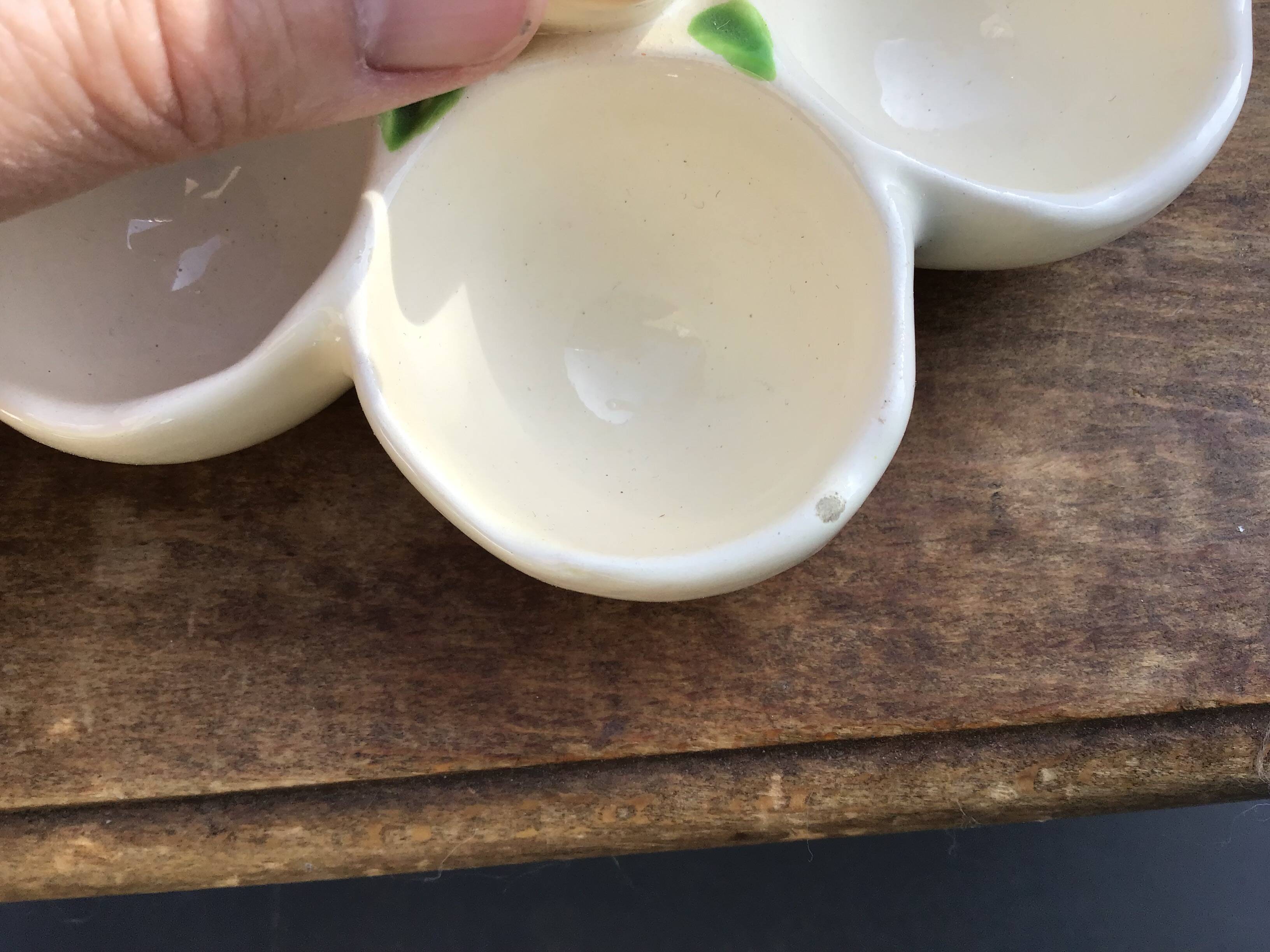 Egg cup with central chick decoration