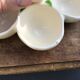 Egg cup with central chick decoration