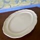 Old very large serving platter with scalloped edges by Villeroy and Boch.