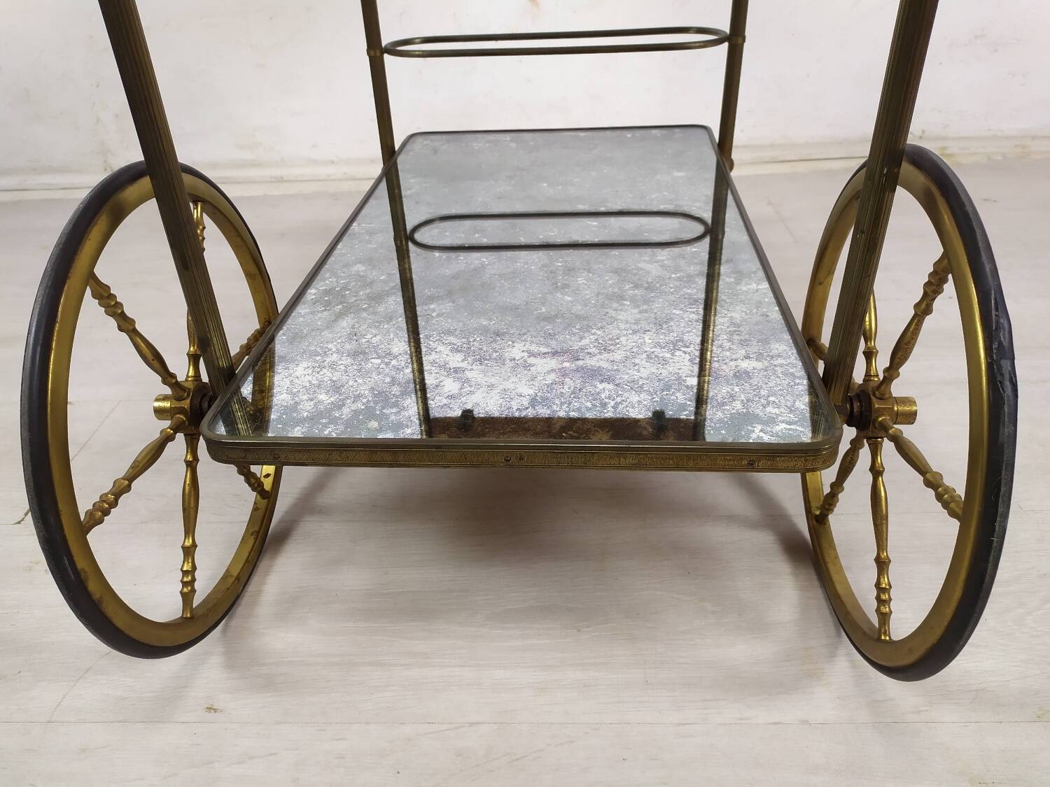 Brass and glass rolling trolley