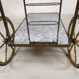 Brass and glass rolling trolley