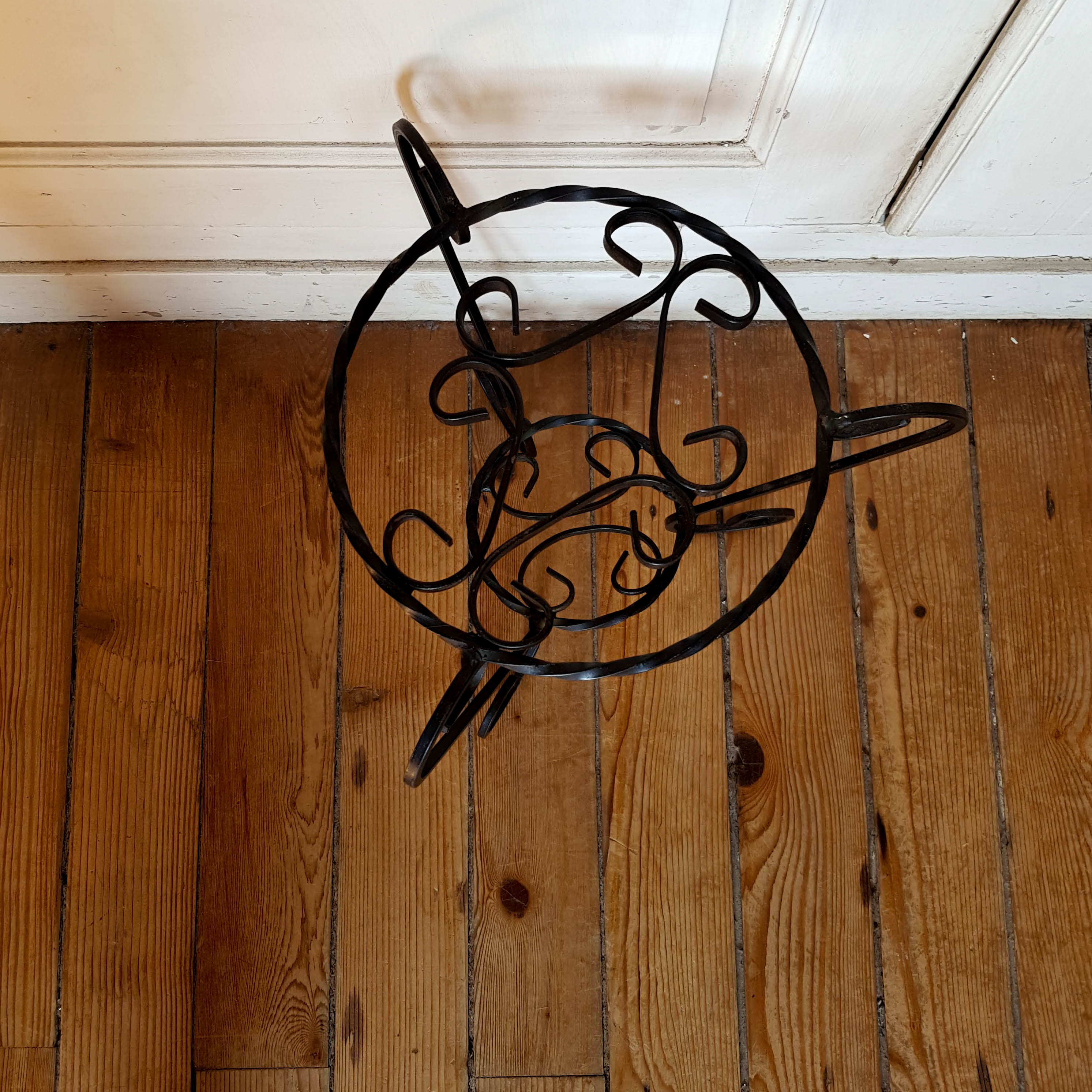 Wrought iron plant holder