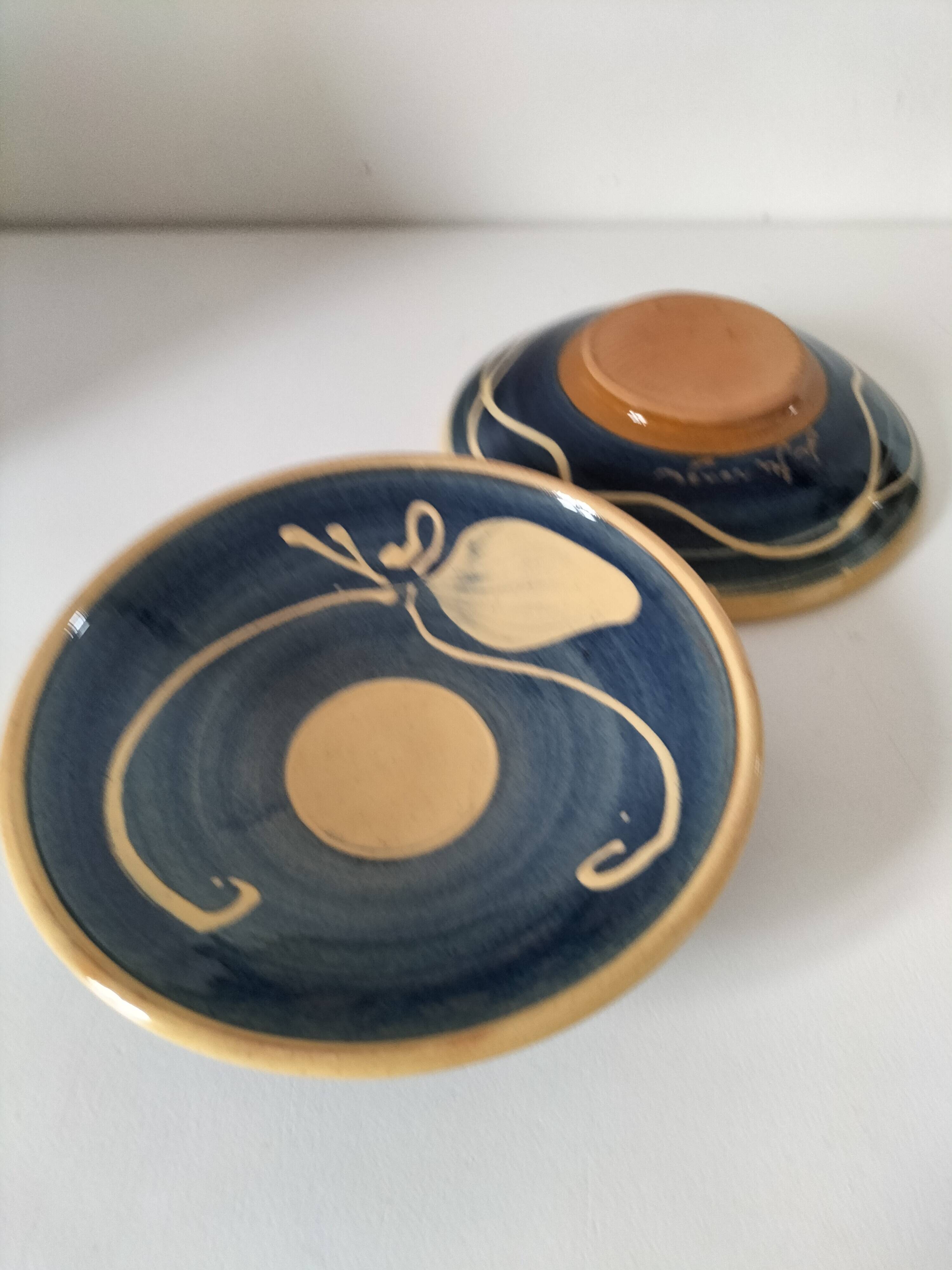 Pair of handcrafted bowls by Le Fer Rouge with blue and beige decor