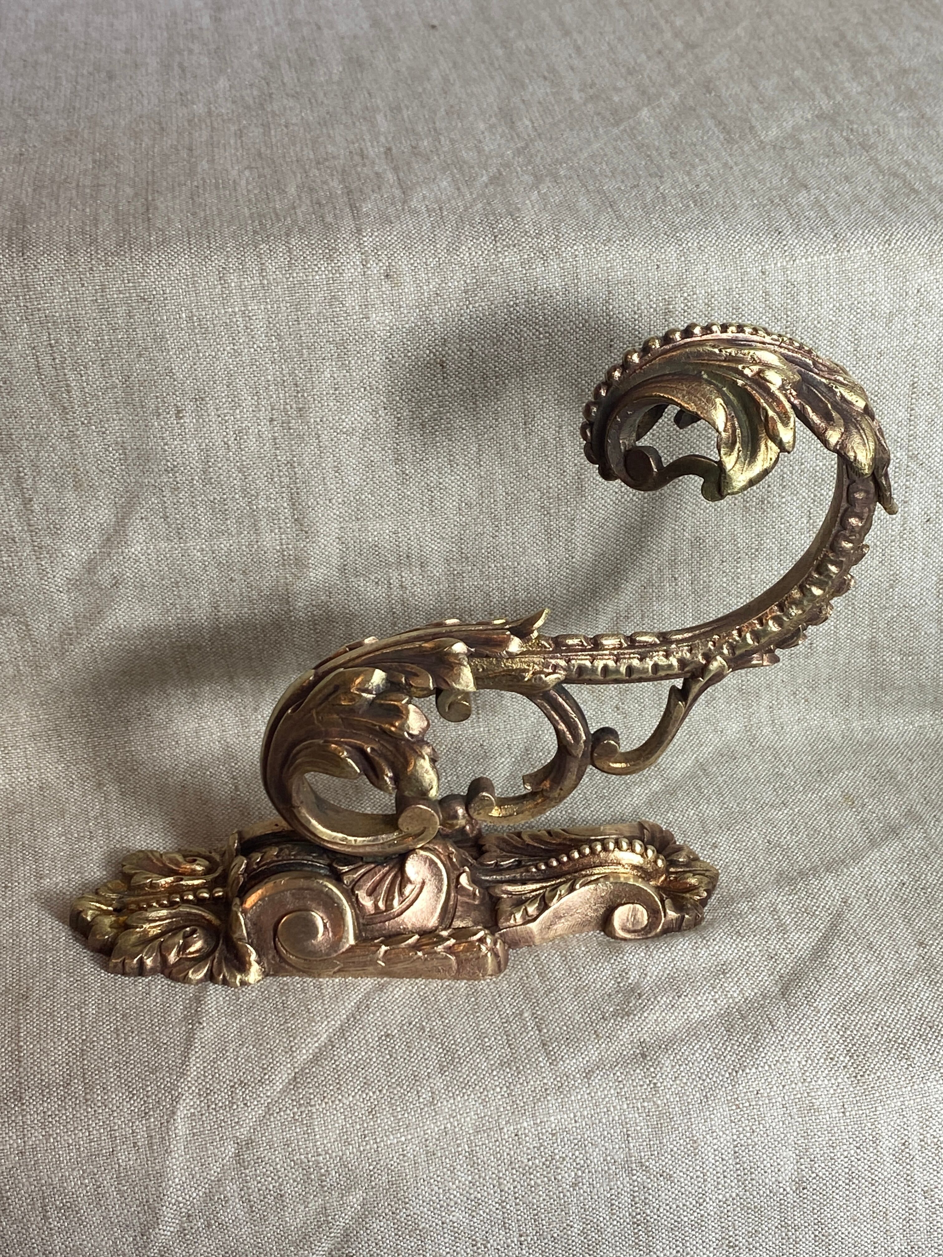 Golden bronze coat hook, 19th century