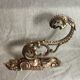 Golden bronze coat hook, 19th century