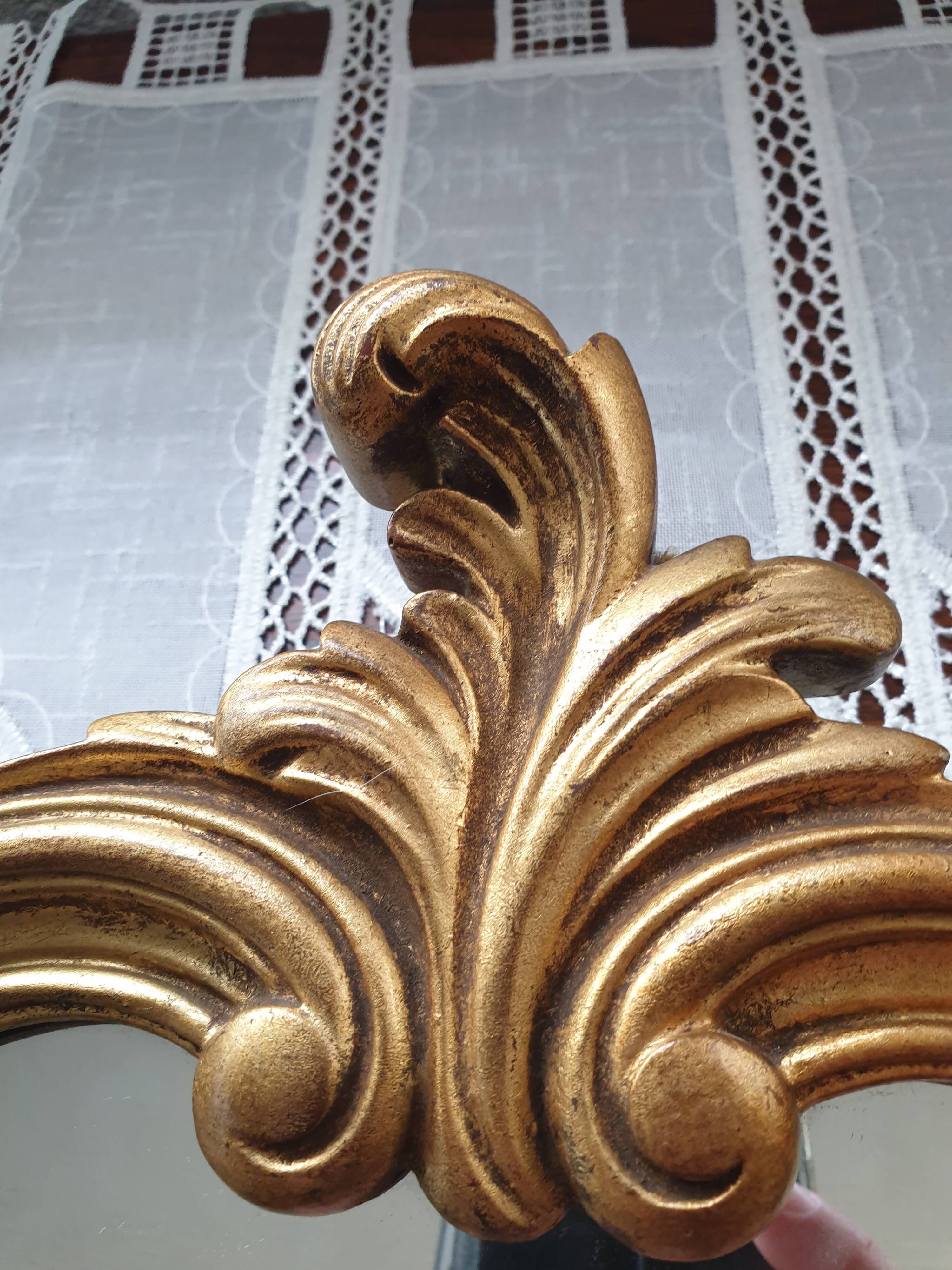 Rocaille mirror in gilded carved wood