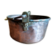 large copper and bronze cauldron