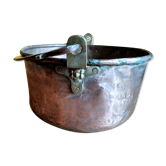 large copper and bronze cauldron