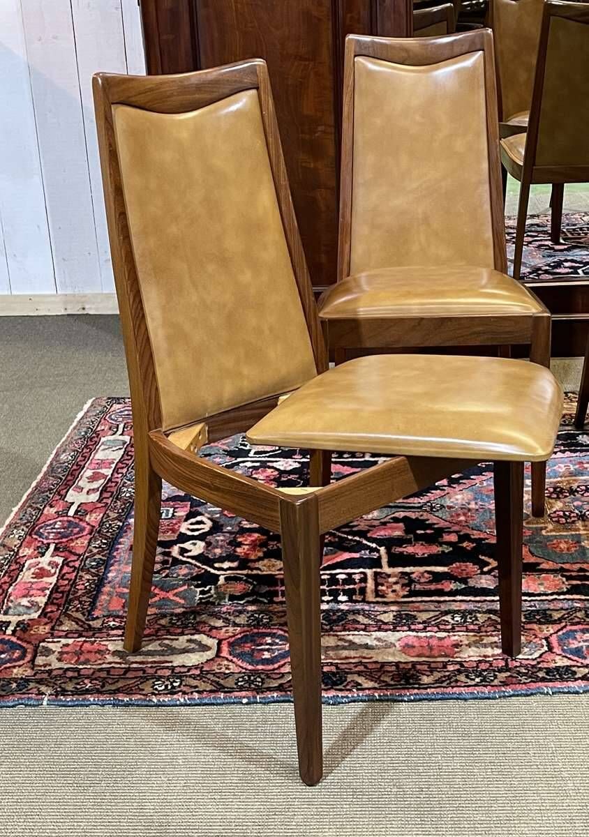 Set of 4 G-Plan chairs in teak and faux leather from the 1970s.