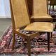 Set of 4 G-Plan chairs in teak and faux leather from the 1970s.