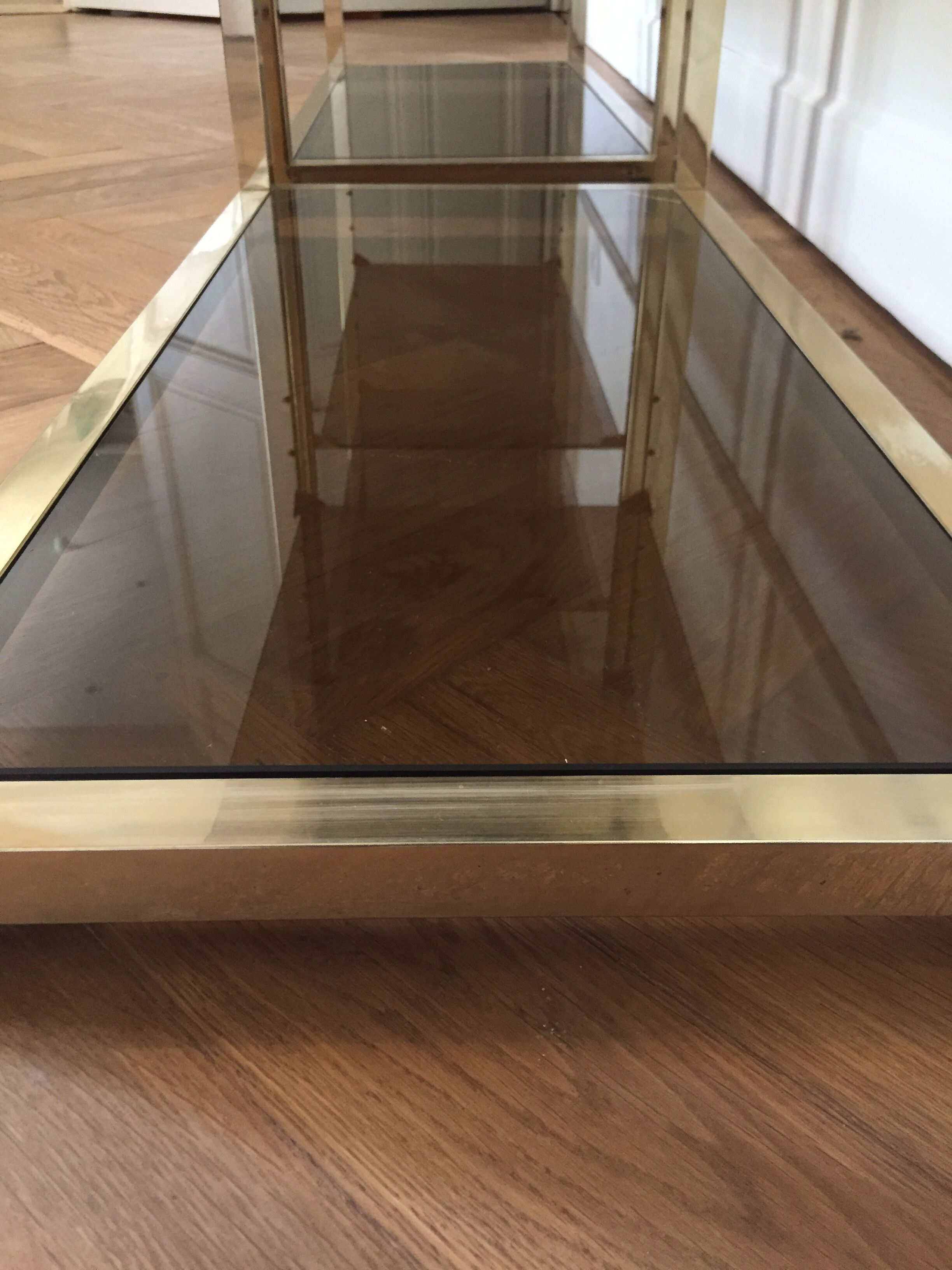 Pair of consoles brass shelves and smoked glass design Roche Bobois