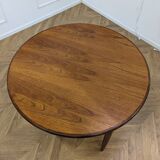 Round and extendable dining table published by G-Plan
