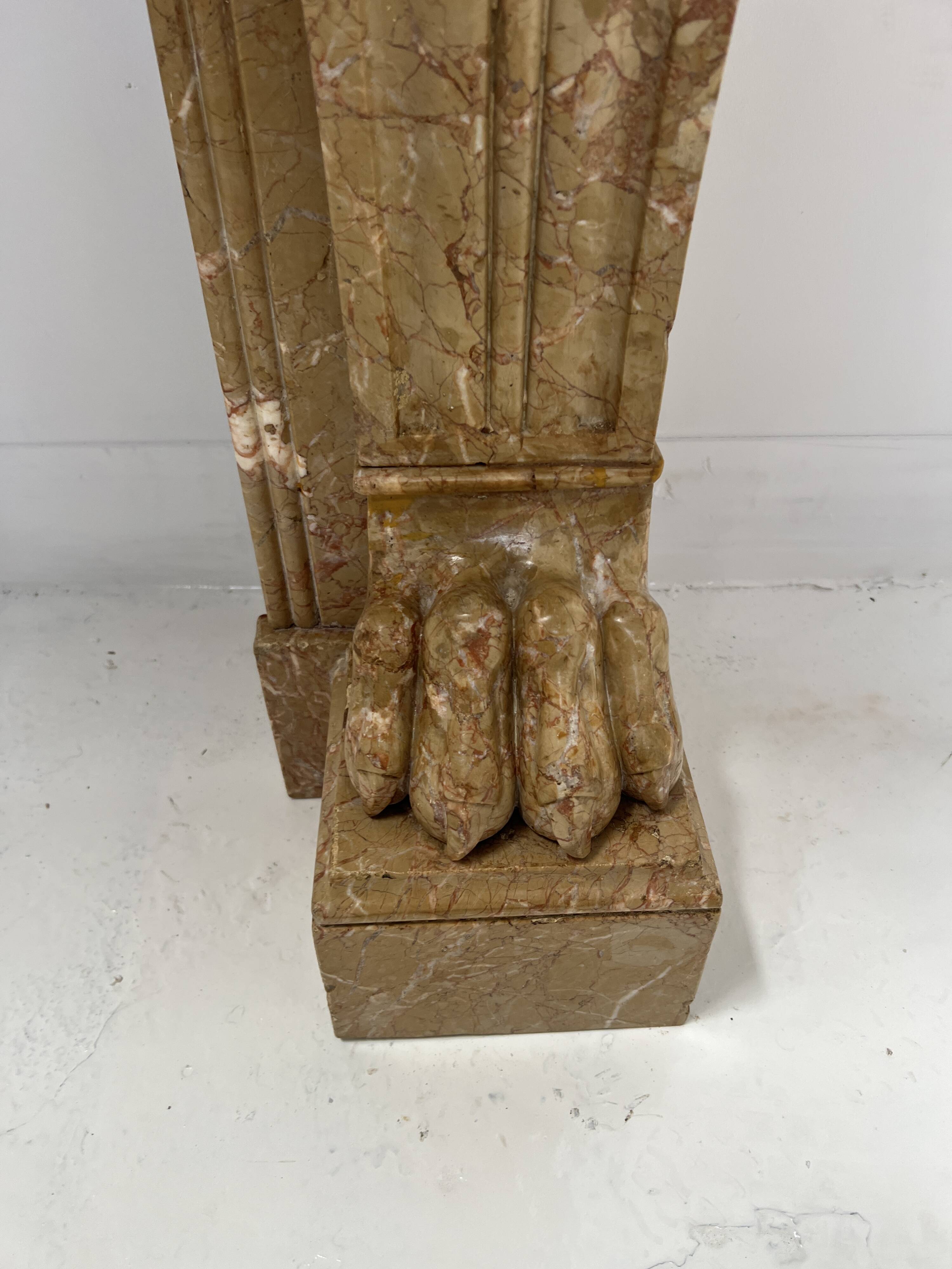 Napoleon III fireplace with claw feet in speckled marble, 19th century.