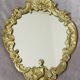 Miroir en bronze doré avec ornement anges