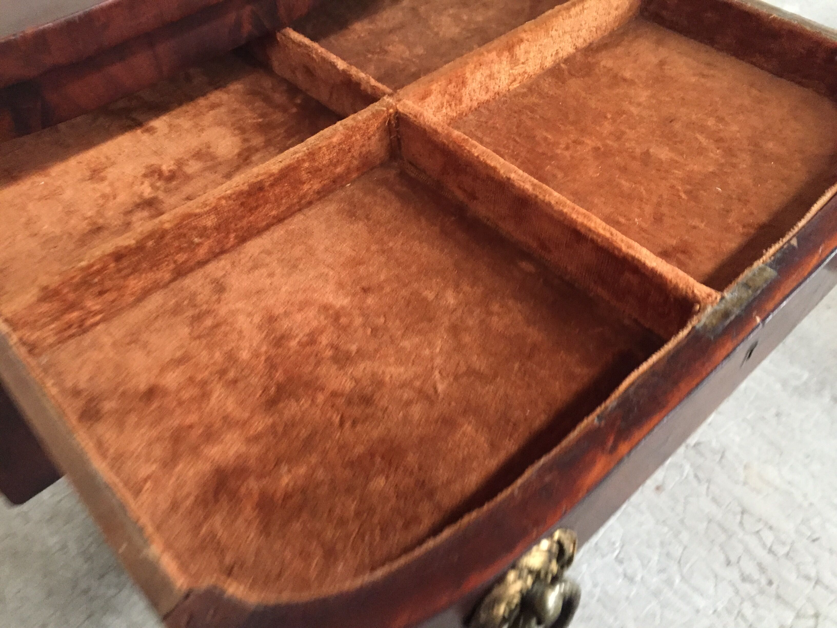Small piece of english furniture has 3 drawers in mahogany for silverware