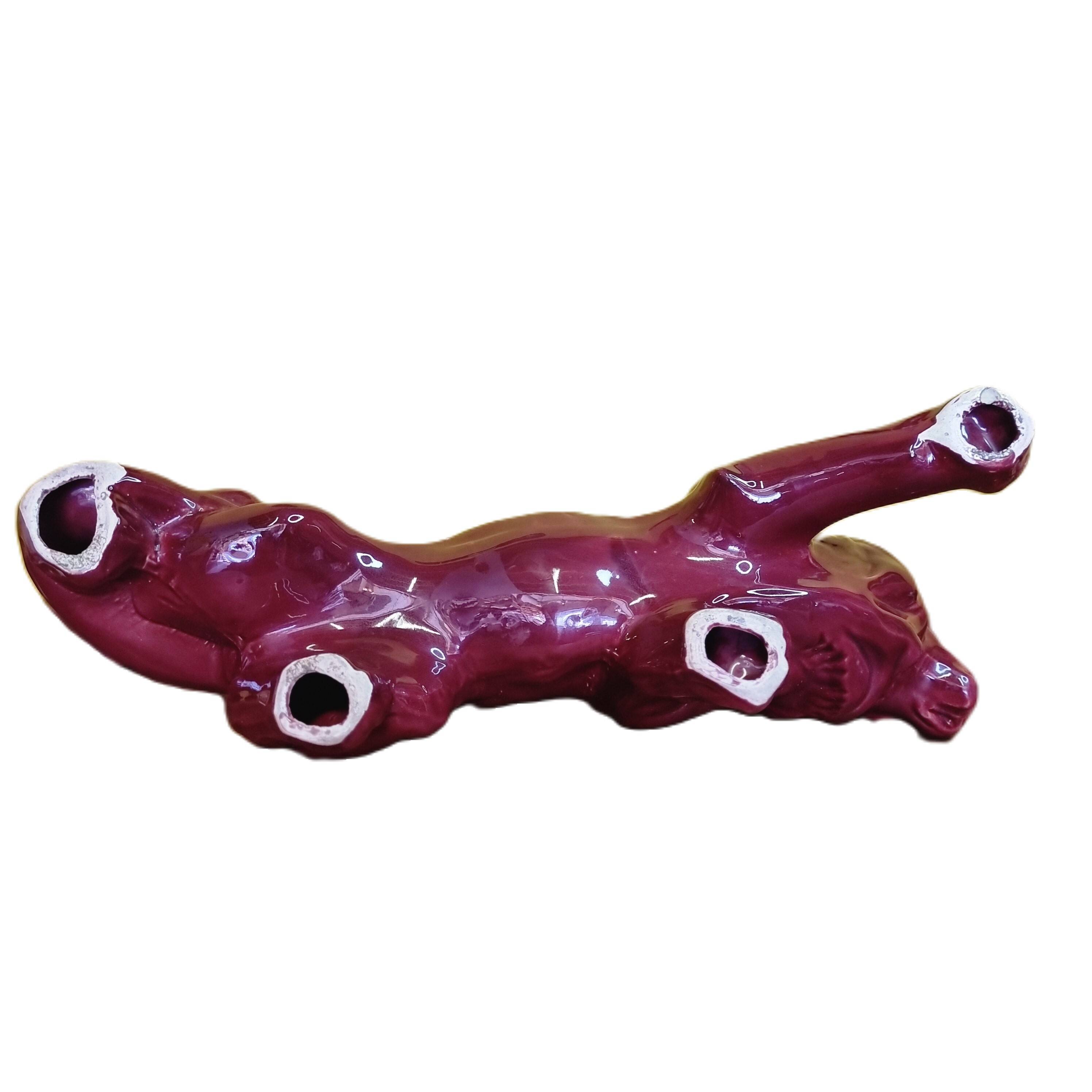 French Art Deco red glazed Ceramic Statue Of A Lion, 1930s