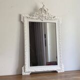Late 19th century mirror with decorated pediment. 110x70. White.