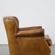 Cognac-colored subtle armchair