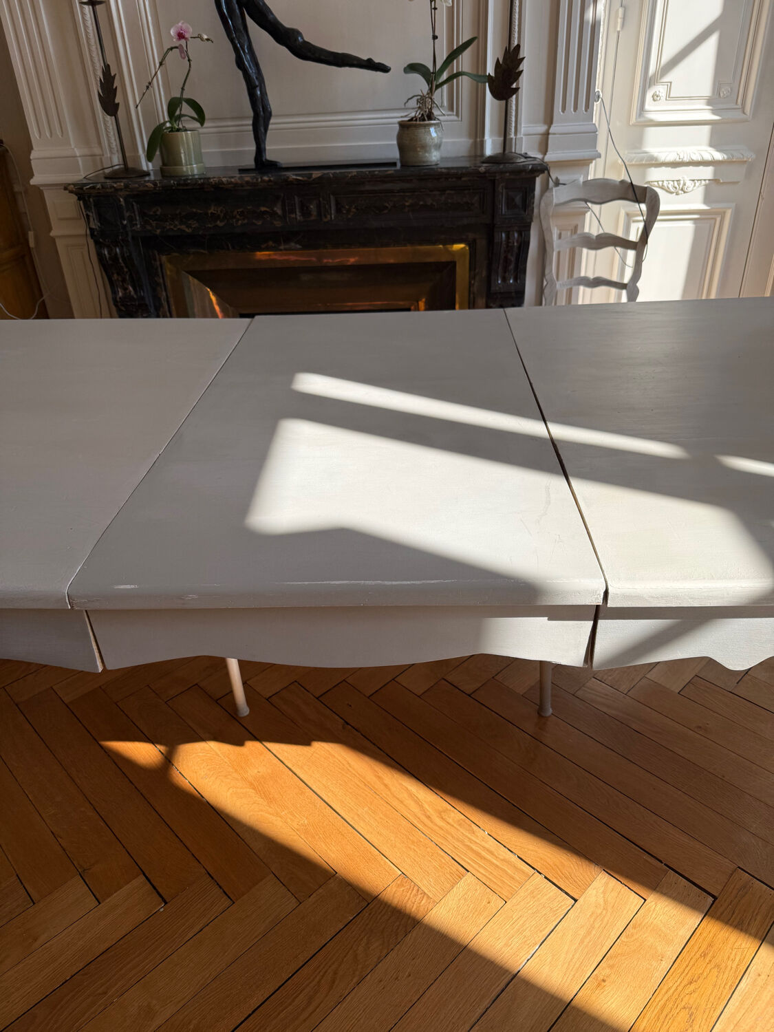 Large solid wood table made by a cabinetmaker.