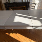 Large solid wood table made by a cabinetmaker.