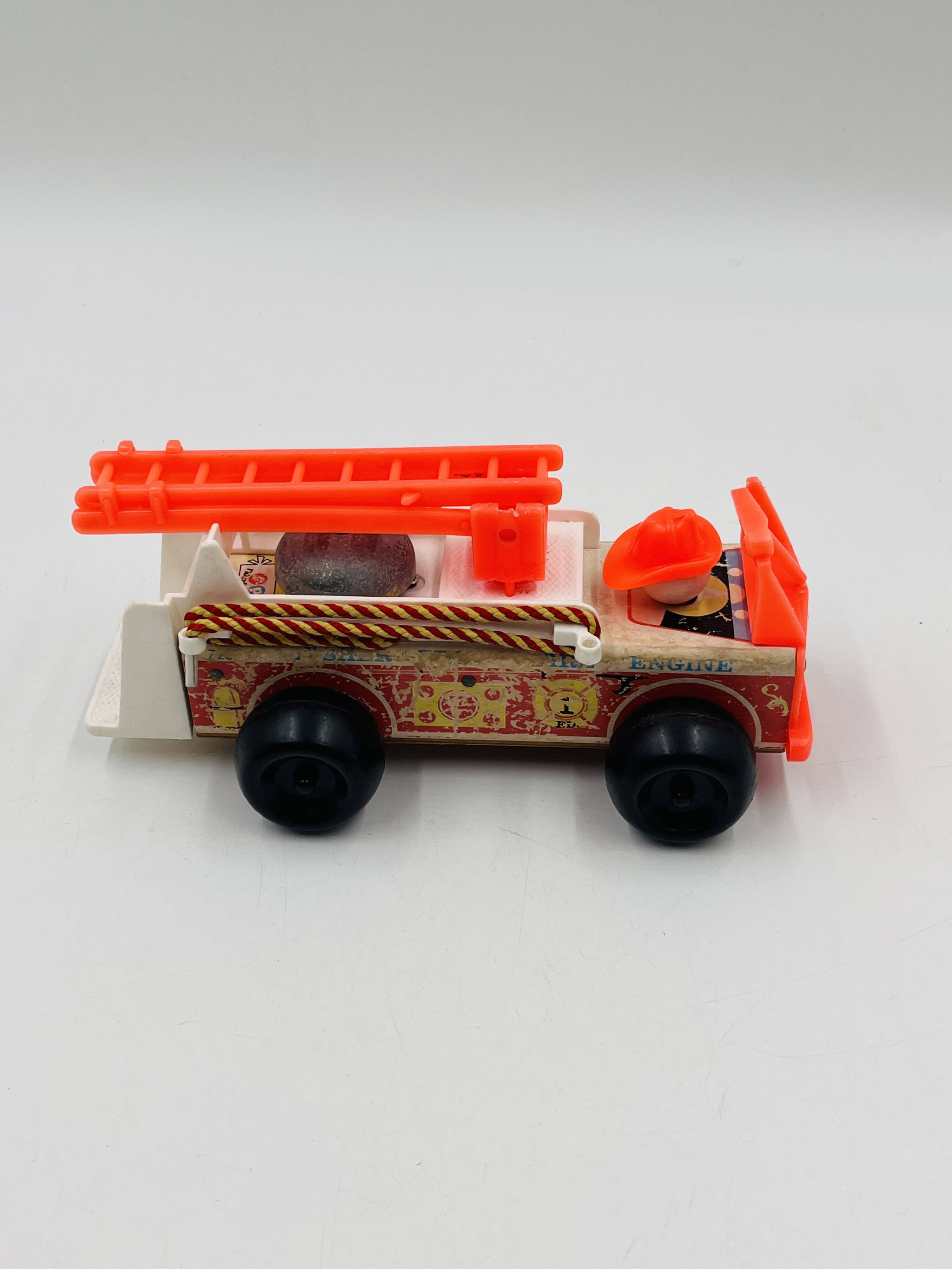 Set of 4 Fisher-Price wooden toys from the 1960s