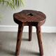 Wooden tripod stool