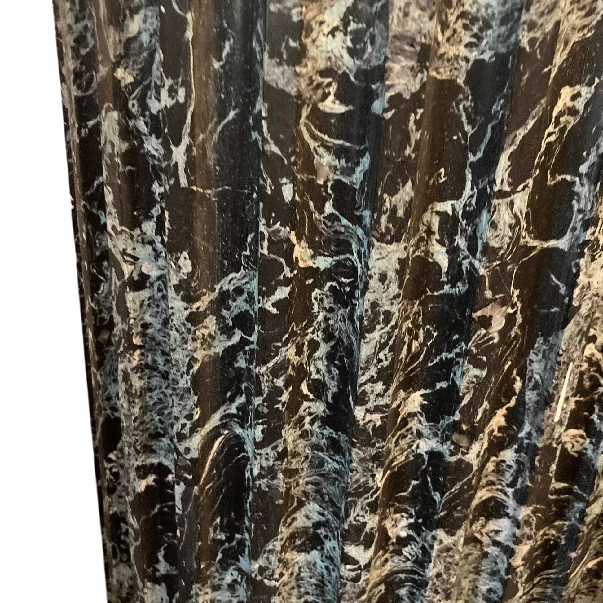 Pair of black and green scagliola columns from the 19th century.