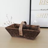 Dark wooden harvest basket