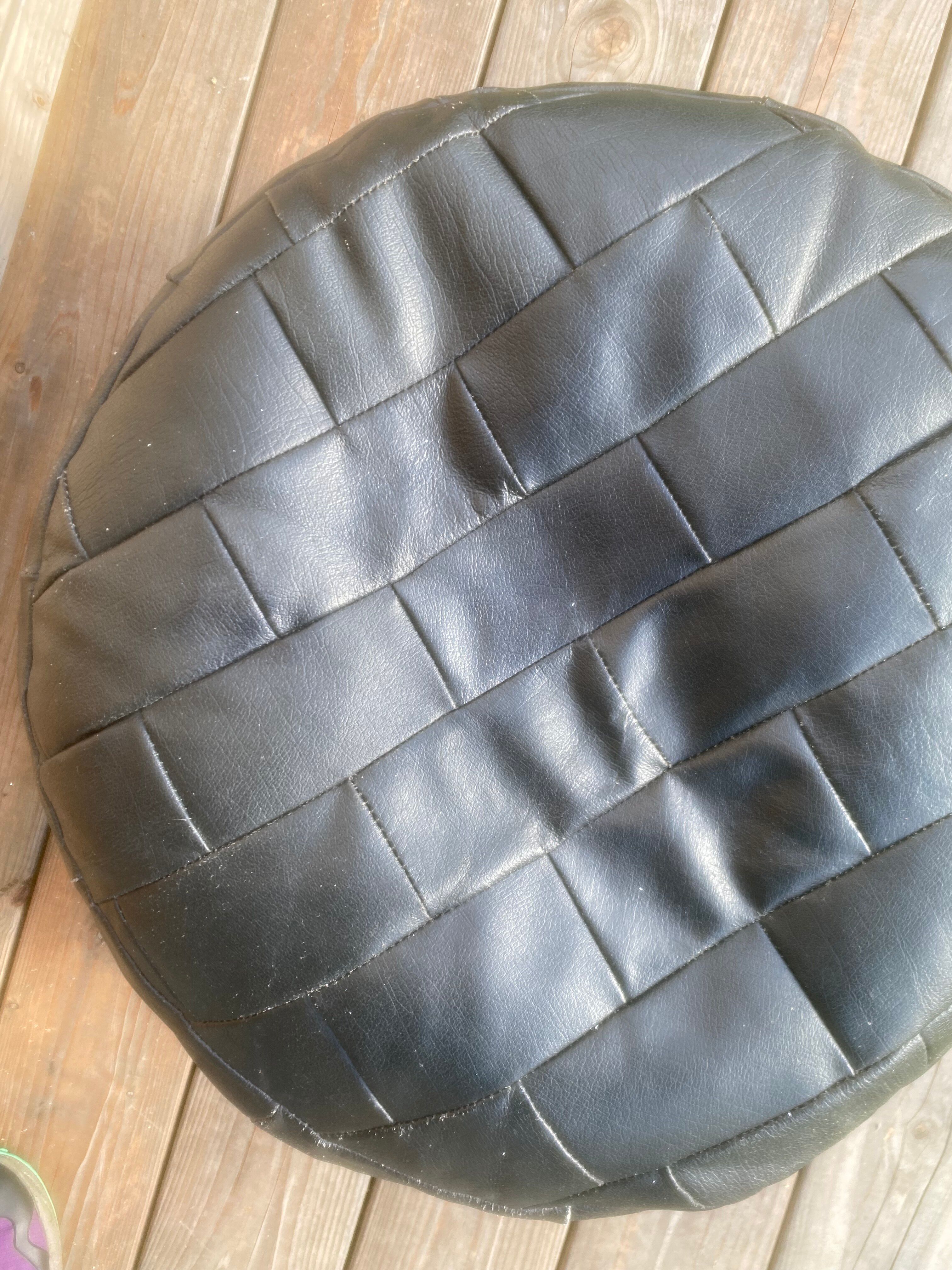 Black leather patchwork pouf by De Sede