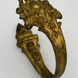 Paire de porte-embrasses en bronze dorée style Rocaille