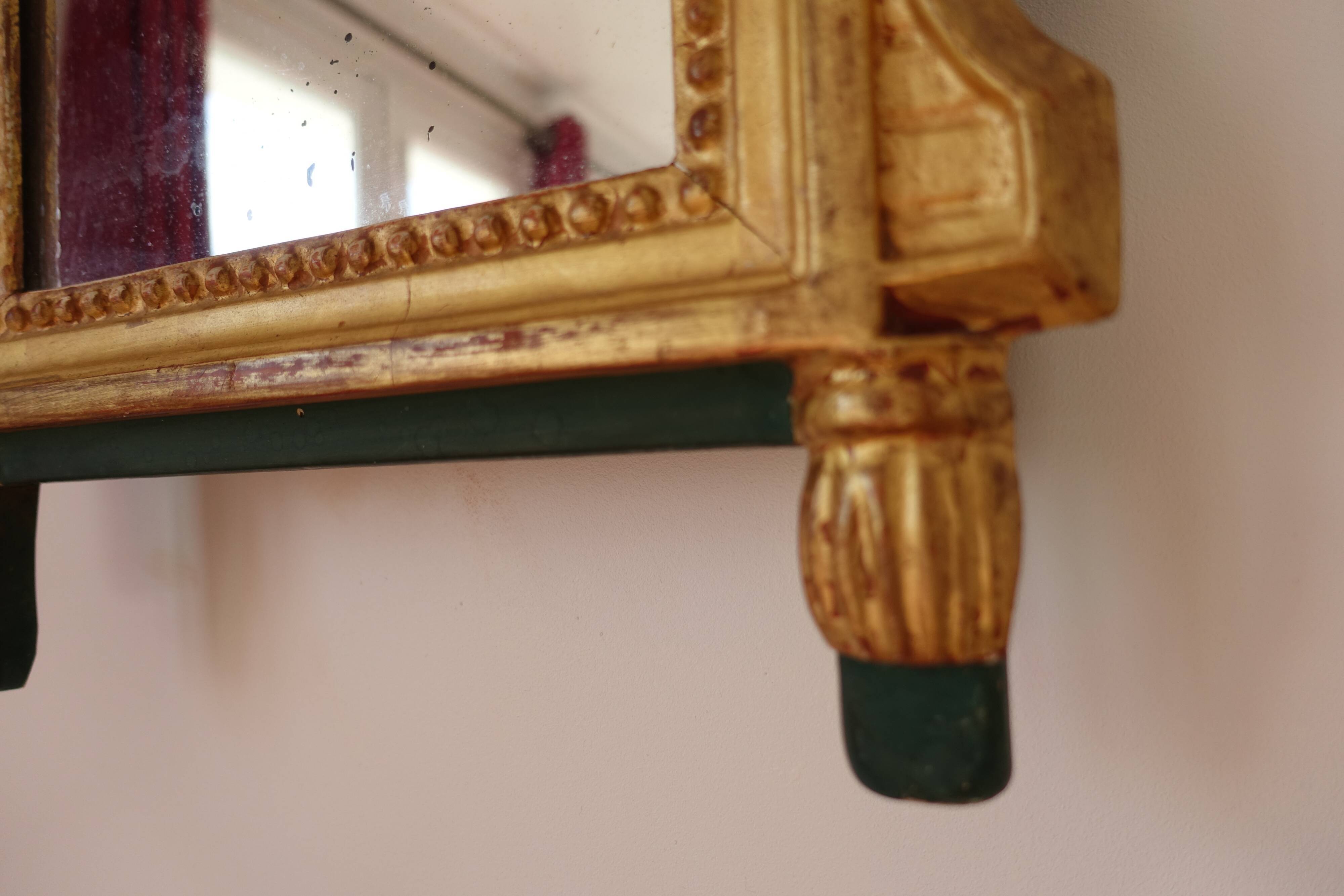 Miroir Louis XVI en bois doré 35x 65cm