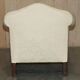 Pair of Edwardian armchairs from 1910 with carved legs and fabric.