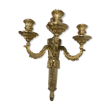 Wall light in gilded bronze