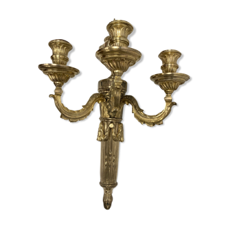 Wall light in gilded bronze