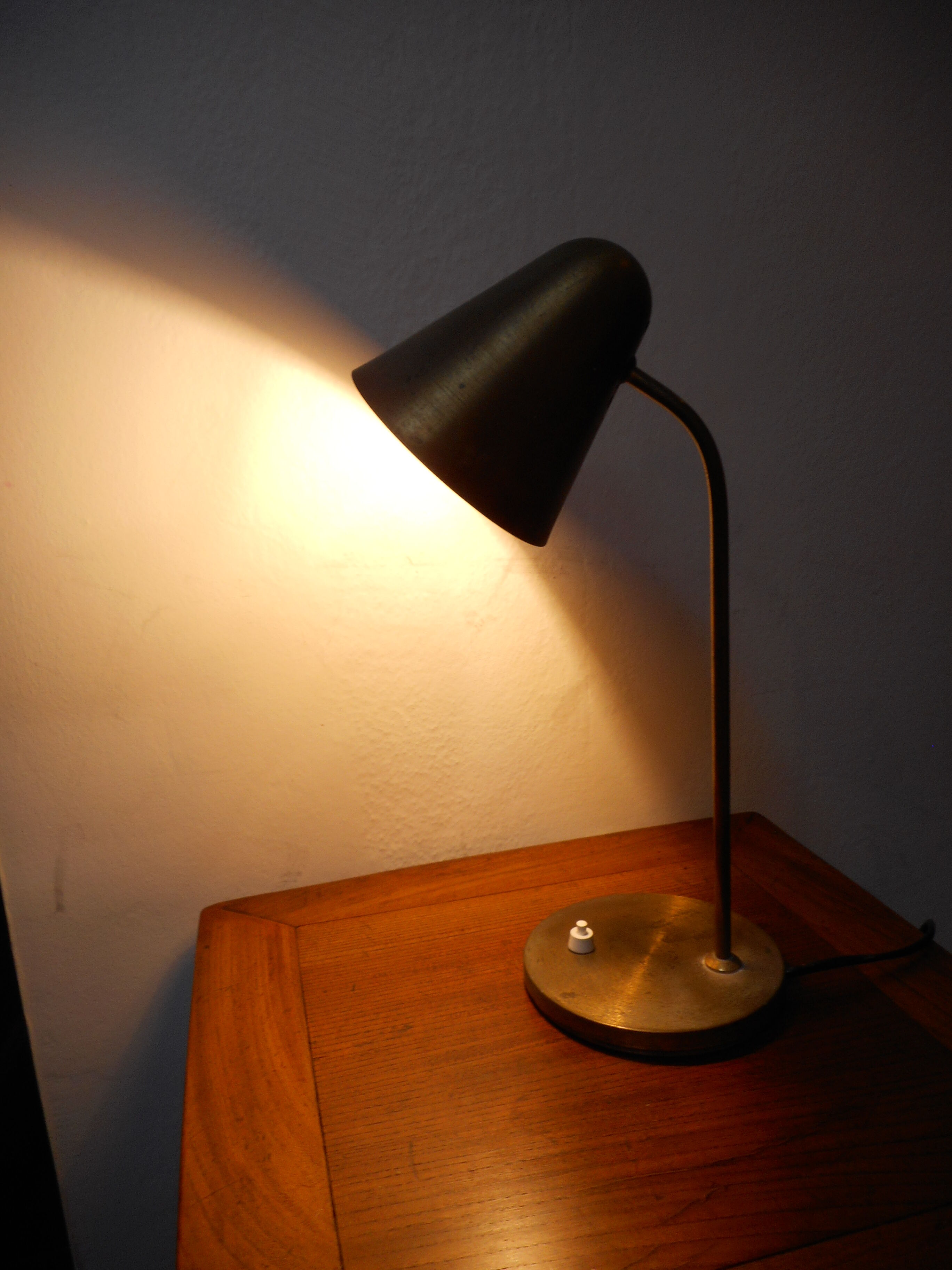 Hinged brass lamp