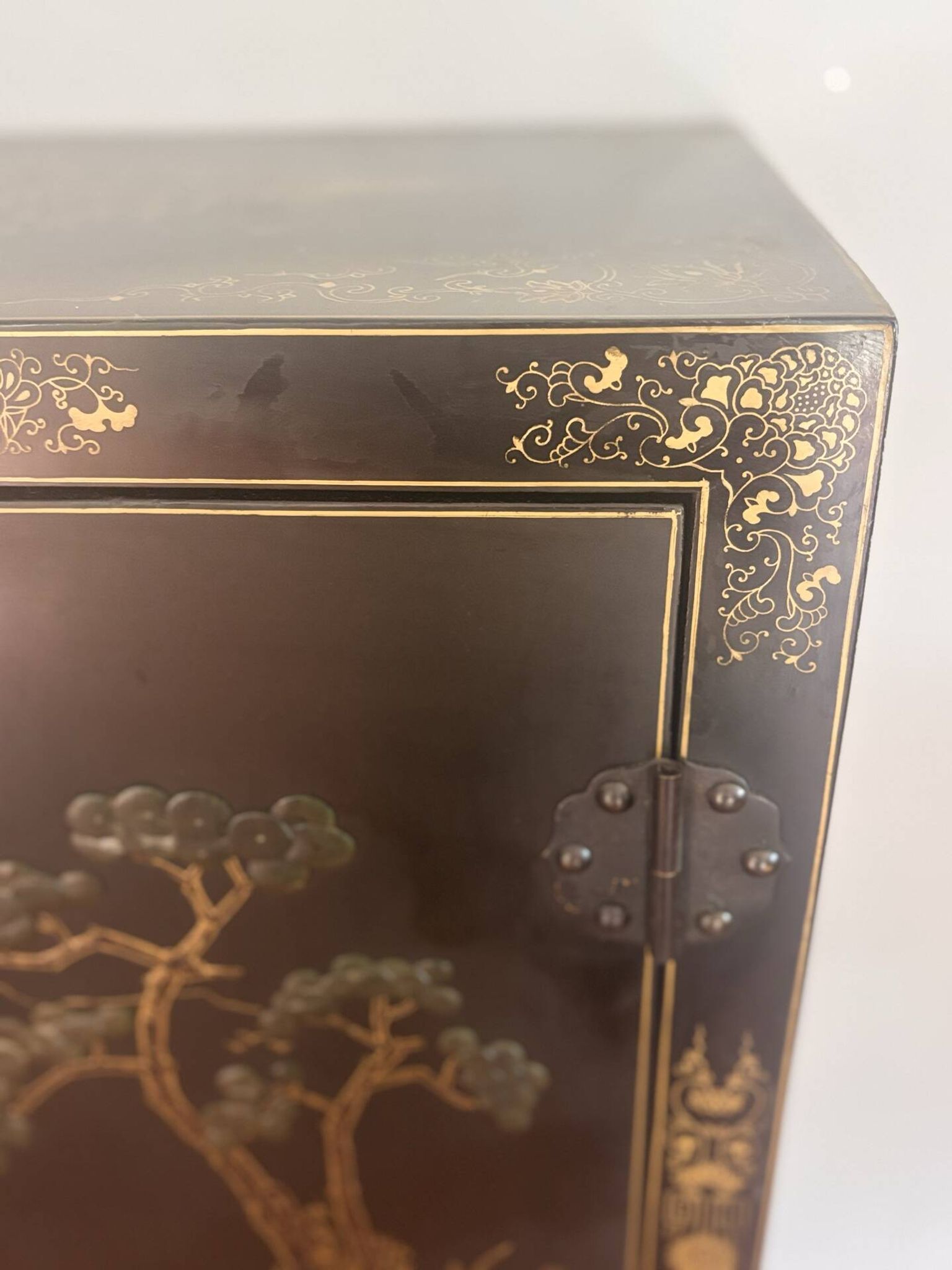 Magnificent black and gold lacquered Chinese cabinet.