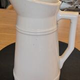 Cream glazed ceramic pitcher