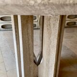 Round travertine dining table with double cross foot